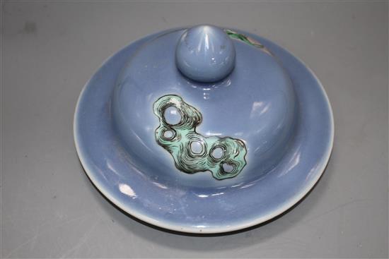 Three Chinese blue ground covers, late 19th century, including a pair with famille verte reserves, diameter approx. 17cm, internal rim